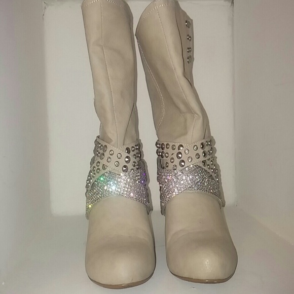 Beige studded cowboy boots