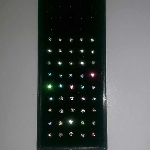 Various unused heart shaped nose rings studs set