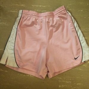 Pink and white running shorts