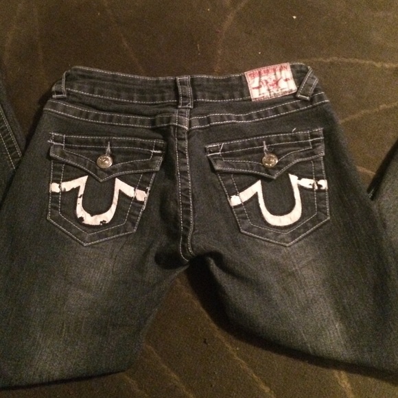 Dark wash true religion jeans with white label