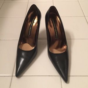 Pointy black heels