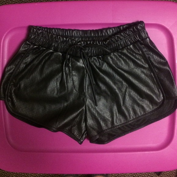 Black fitter faux leather shorts with jaw string!