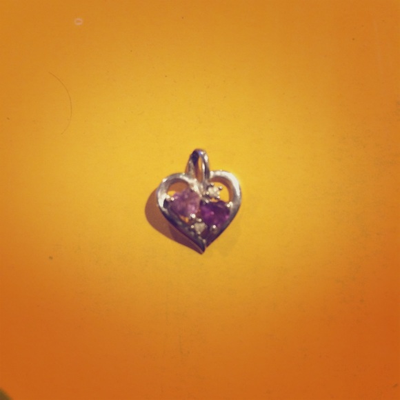 Amethyst and diamond promise heart necklace.