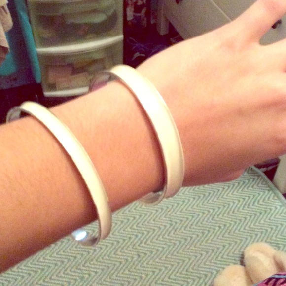 Two white and silver bangles