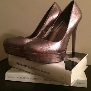 Pewter platform pumps.