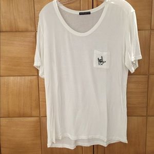 white shirt with rock hand