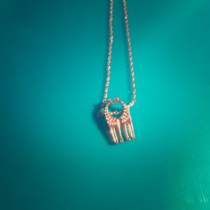 Gold couple giraffe.