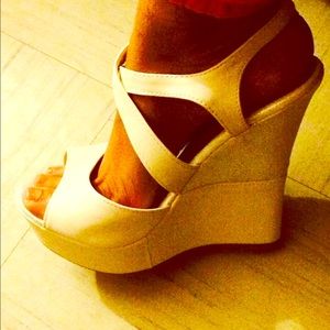 White wedges by Elegant Footwear