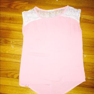 light pink shirt with white lace shoulders