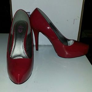 These are a reposh!! Torrid red 5 in heels.