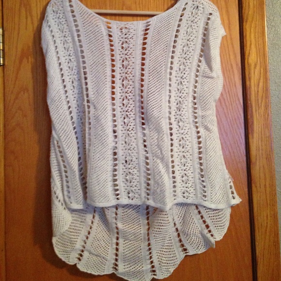 Nude high-low open back top