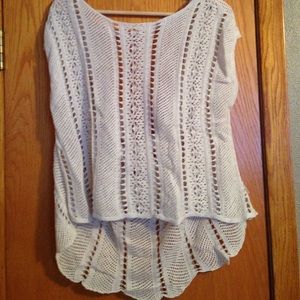 Nude high-low open back top