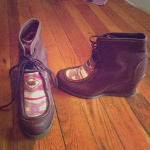 Holding horses woven story brown leather boot