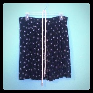 Navy blue knee-high skirt w/belt.