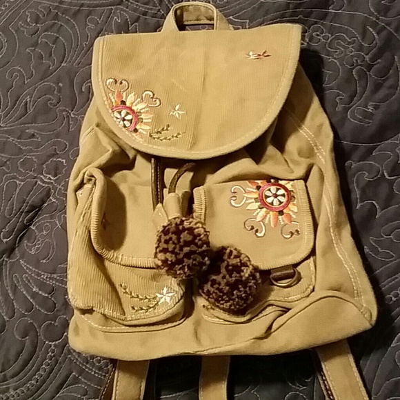 Purse backpack style.