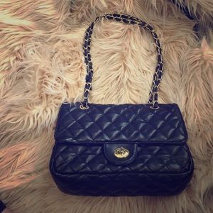 Black and gold chain handbag
