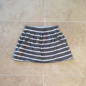 Green and white striped skirt