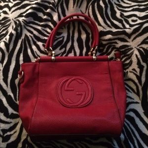 Red Gucci purse