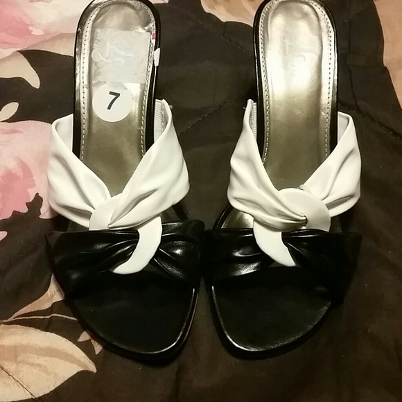 White and black heels