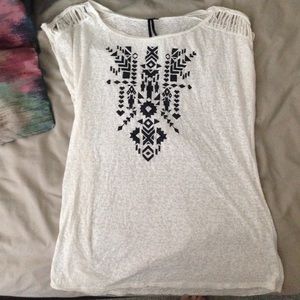 Tribal tee, can fit medium/large
