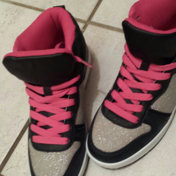 Stuntin like a boss in these sparkle high tops