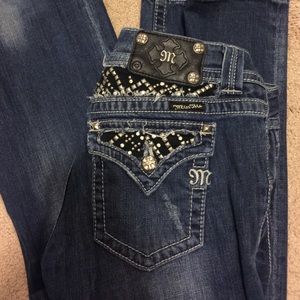 Distressed miss me boot cut jeans