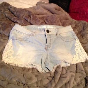 Light denim shorts.