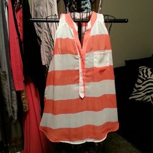 Sheer hi-lo sleeveless shirt.