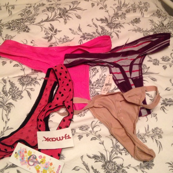 4 size small thongs with tags on.
