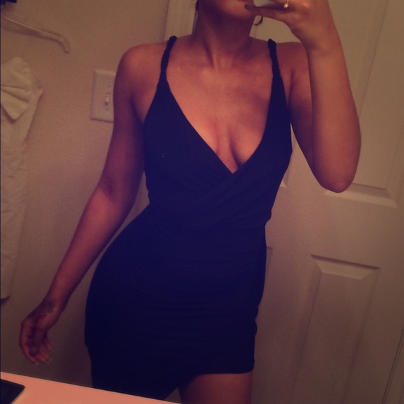 Black BEBE high-low bodycon dress .