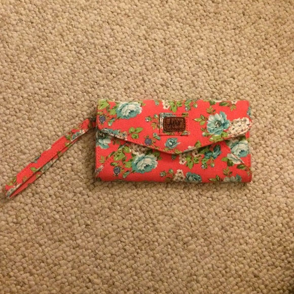 Orange wristlet with blue floral print