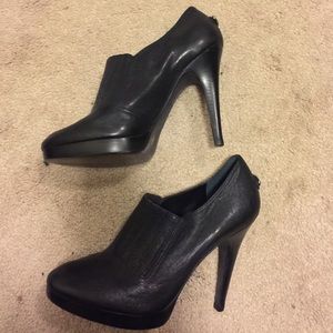 Black leather heeled booties