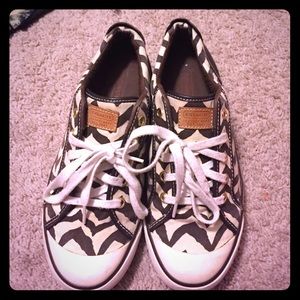 Brown and white zebra coach shoes