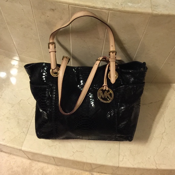 Michael Kors black bag with gold hardware