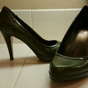 Somewhat of an olive green high heels.