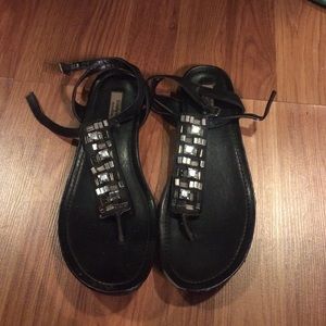 Black sandals with detailing