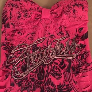 Hot pink and black top.