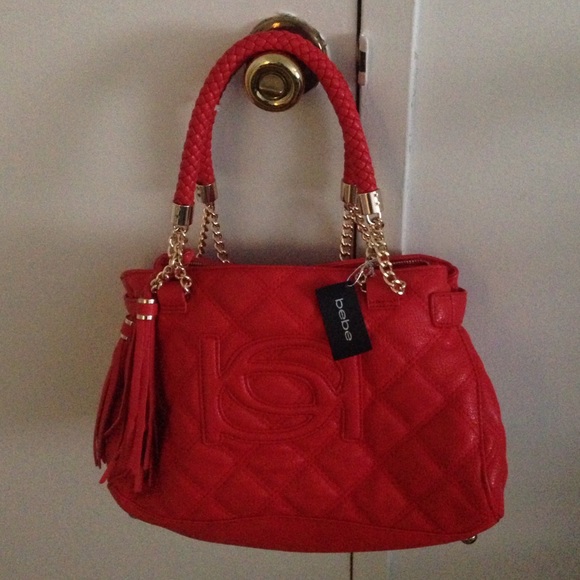 Brand New Bebe Purse (red orange color)
