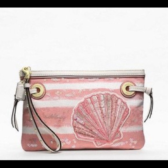 Coach Audrey shell motif zip top wristlet