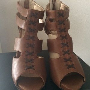 Deep brown heels with stitch and cut out details