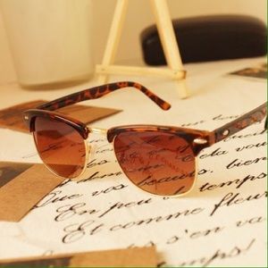 Clubmaster style sunglasses