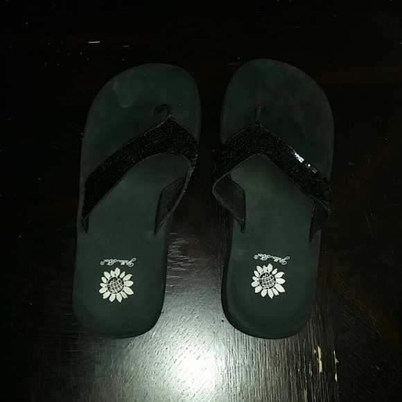 Yellow box flip flops