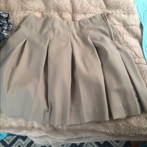 Pleated uniform skirt.
