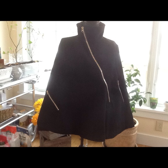 Designer, new with tags black Cape.