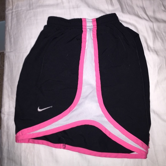Black and hot pink Nike shorts, tempos