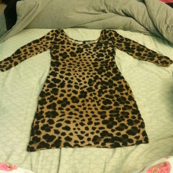 Short and tight quarter sleeve cheetah print dress
