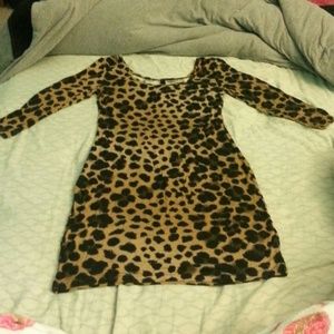 Short and tight quarter sleeve cheetah print dress