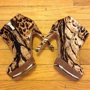 Vince Camuto animal print booties.