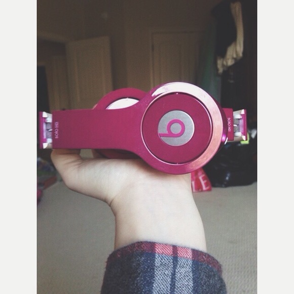 HOLD: beats by dre // solo headphones in magenta.
