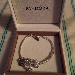 Authentic Pandora bracelet with 4 charms